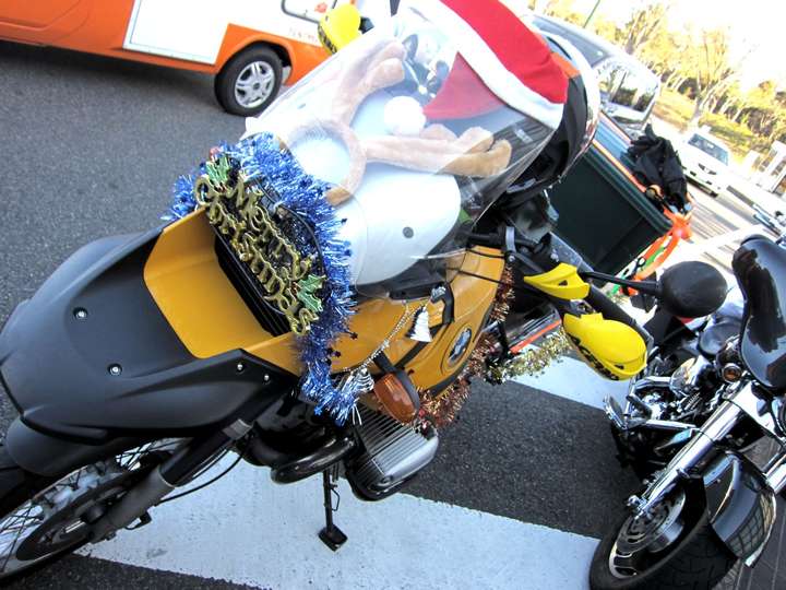 front of motorcycle with xmas fake snow on it