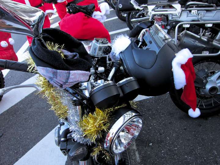 santa helmet on the front of a motorbike